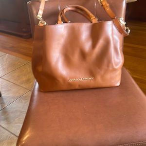 Authentic Dooney &Burke Tote. Also comes with crossbody strap.